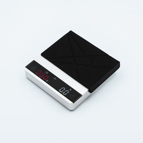 espresso coffee scale that is 95mm wide, 100mm in length and 19mm thick