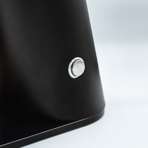 image of button on the side of the DF64V Electric Coffee Grinder