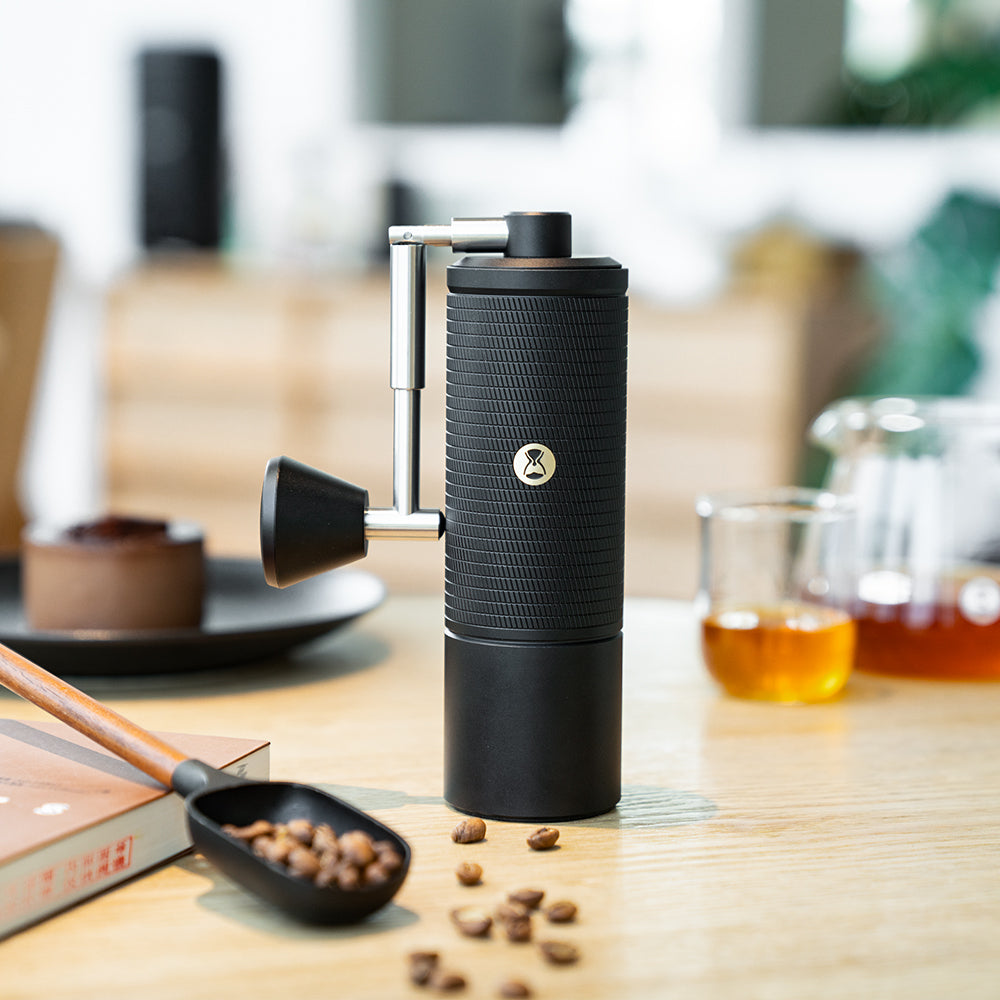 Black Timemore C5 Pro Chestnut Manual Grinder on table