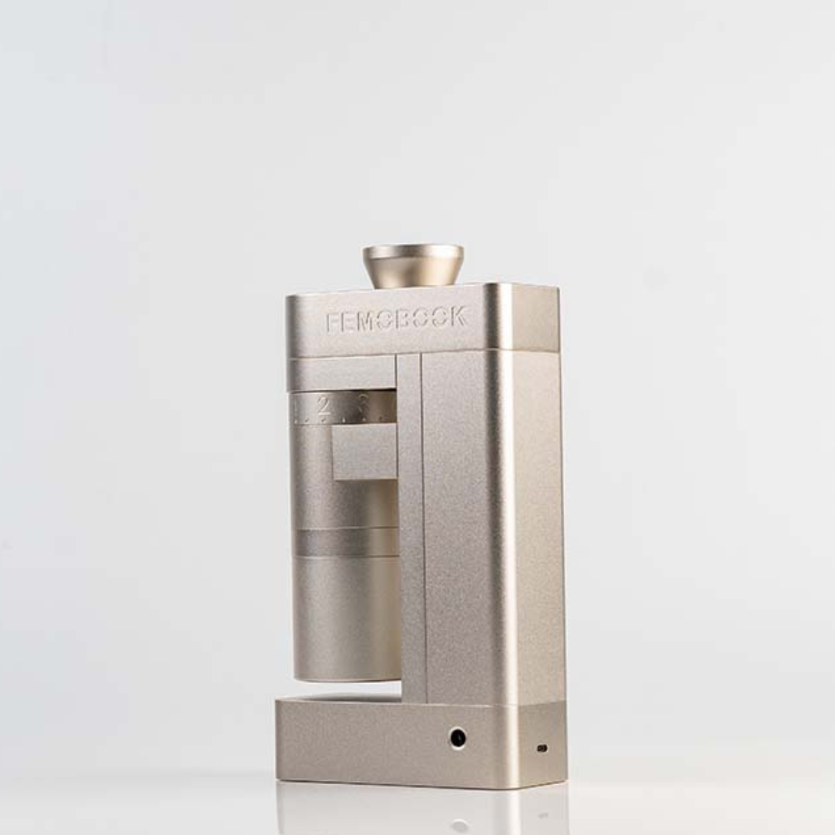silver Femobook A4Z Electric Grinder showing branded elements