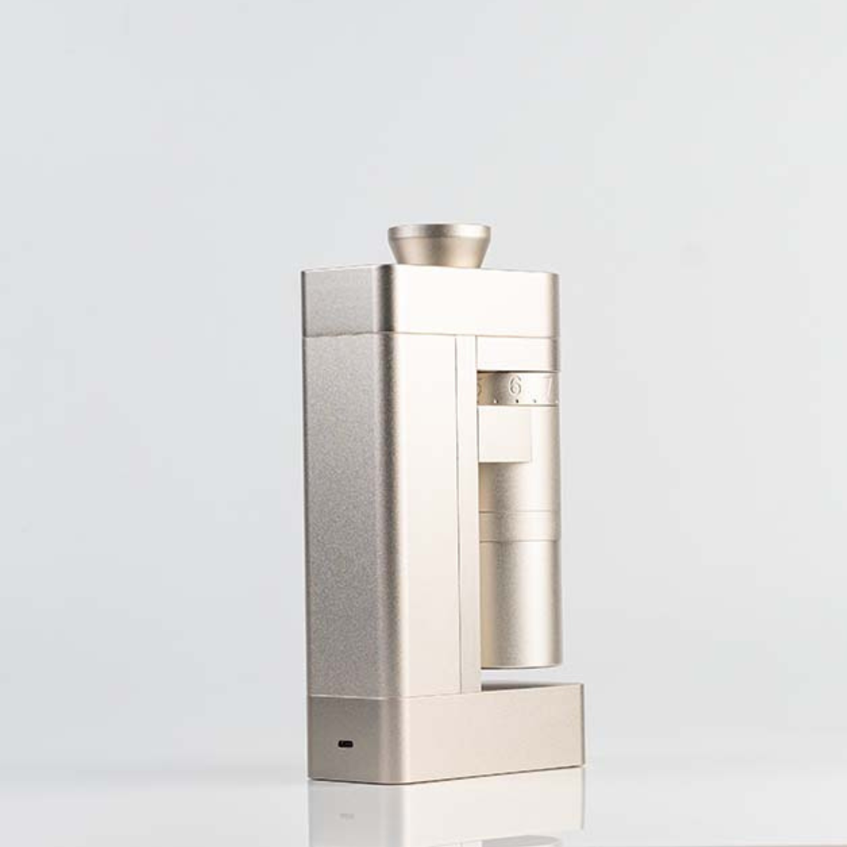 side profile of silver Femobook A4Z Electric Grinder