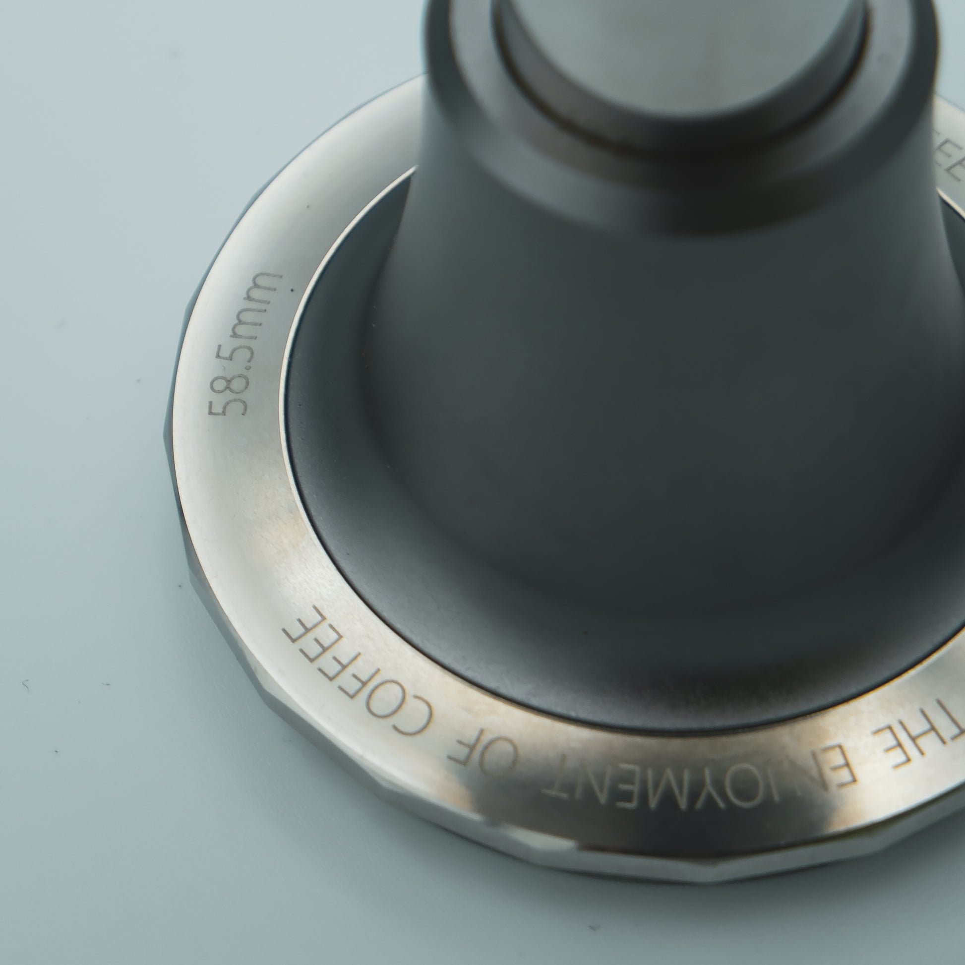 detail on the stainless steel of the zeroHero  Sword Espresso Impact Tamper