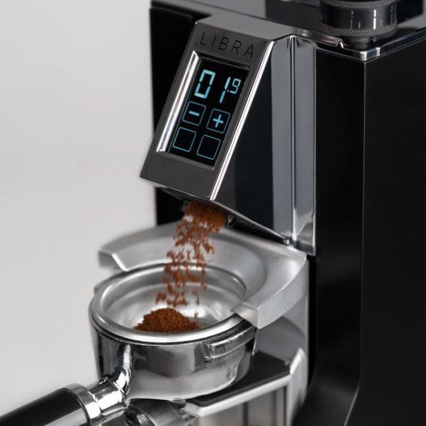 close up of Eureka Mignon Libra Coffee Grinder with screen and grounds