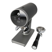 image of silver Eureka Disko Automatic Tamper with portafilter