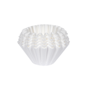 Stack of white coffee filters on a white background
